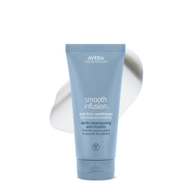 Aveda front packaging showing label and 6.7 fl oz size, clear product identity and benefit