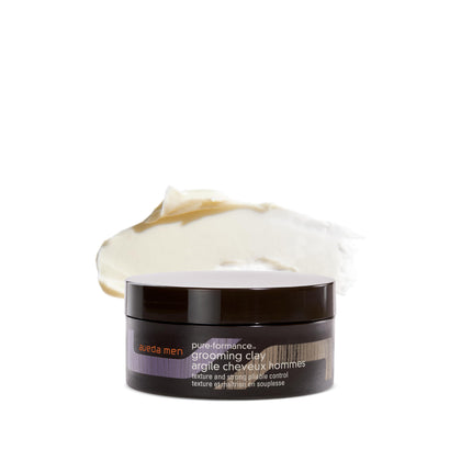 Aveda jar front view showing label and compact grooming clay for easy identification