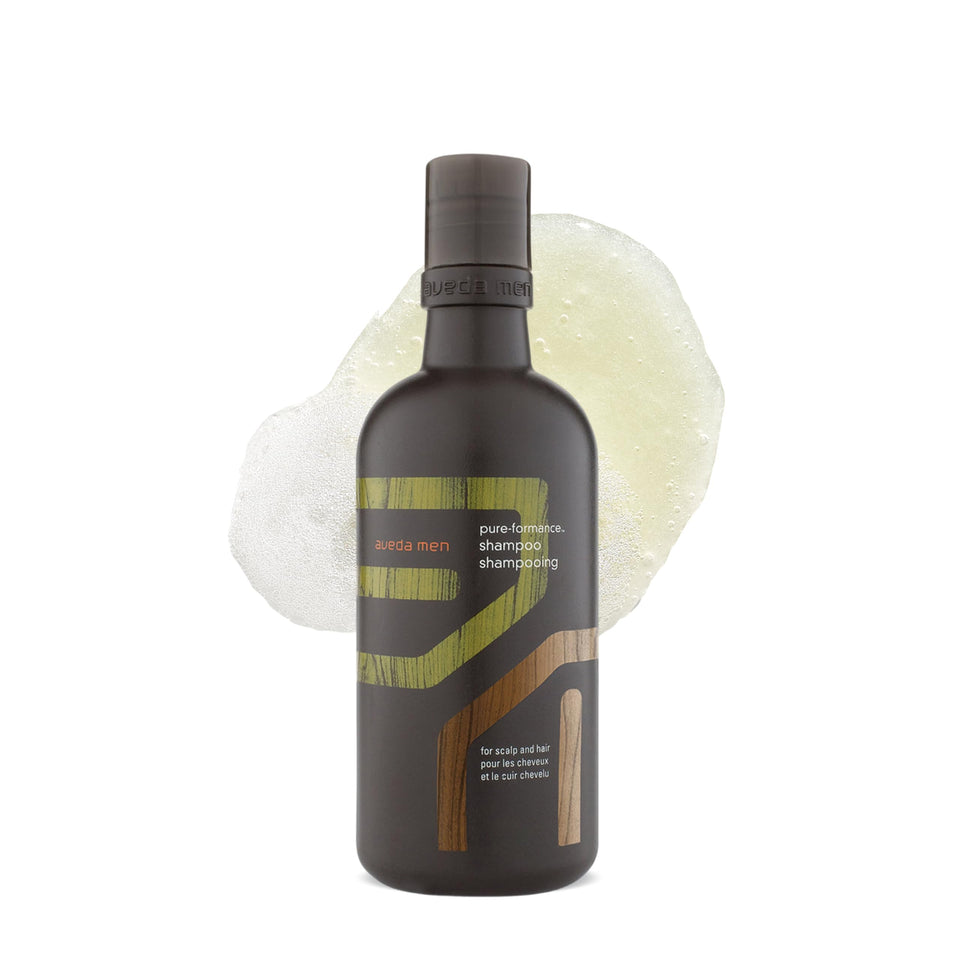 Aveda bottle front view showing branding and clean design benefit