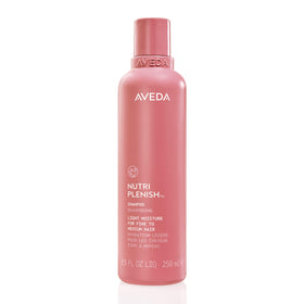 Aveda front bottle showing label and sleek packaging, promotes clean botanical care