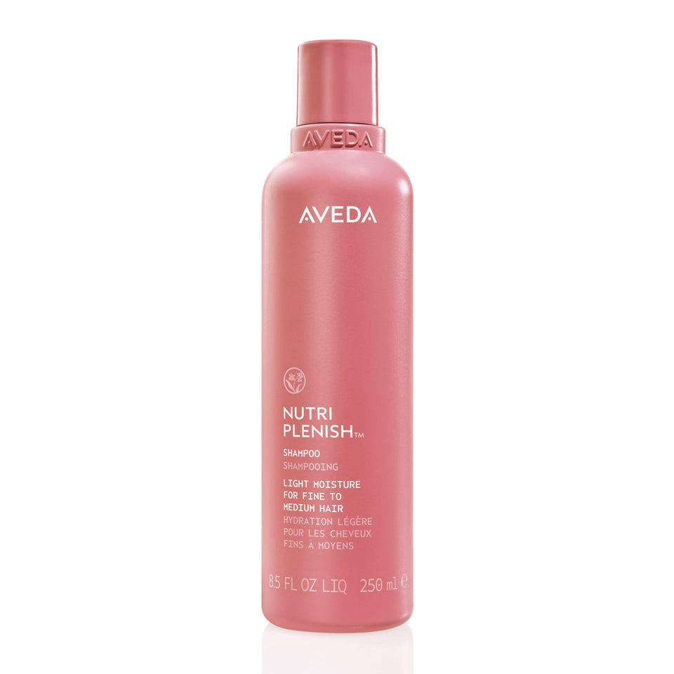 Aveda front bottle showing label and sleek packaging, promotes clean botanical care