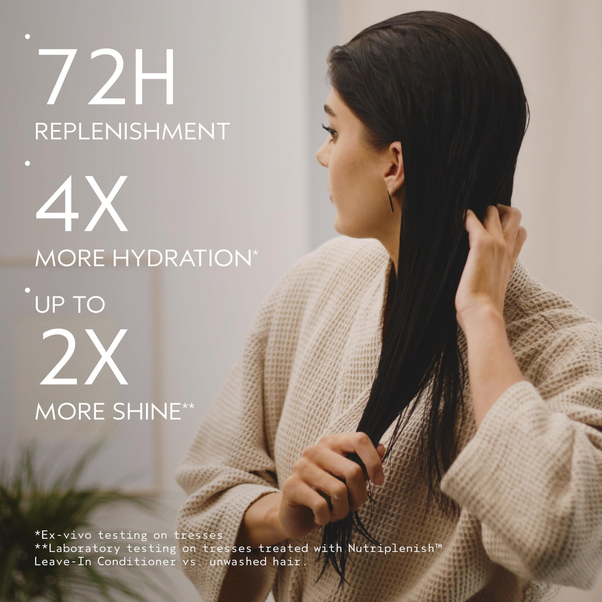 Aveda Nutriplenish spray nozzle close-up delivering fine mist for even coverage