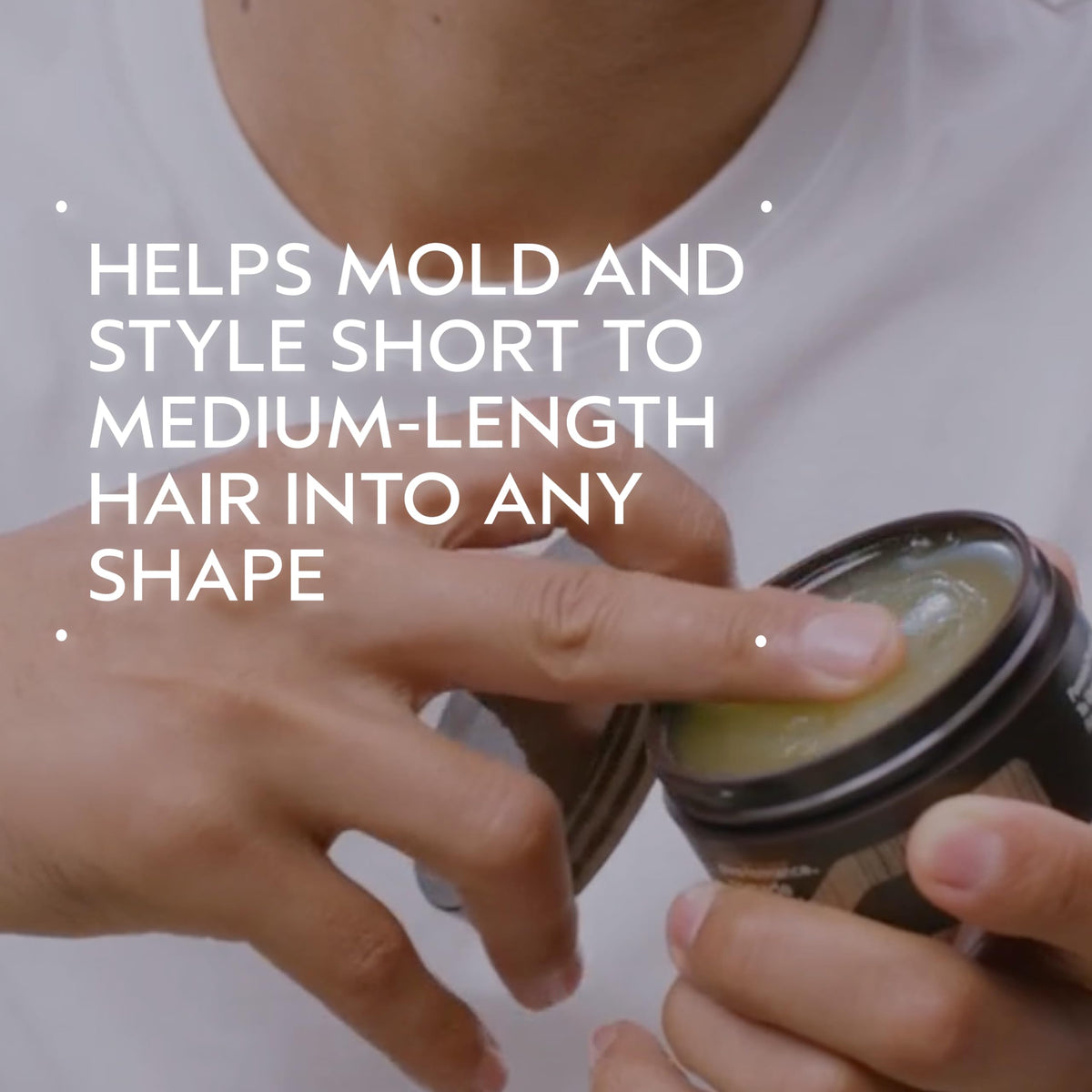 Aveda pomade open jar texture close-up highlighting lightweight, pliable consistency