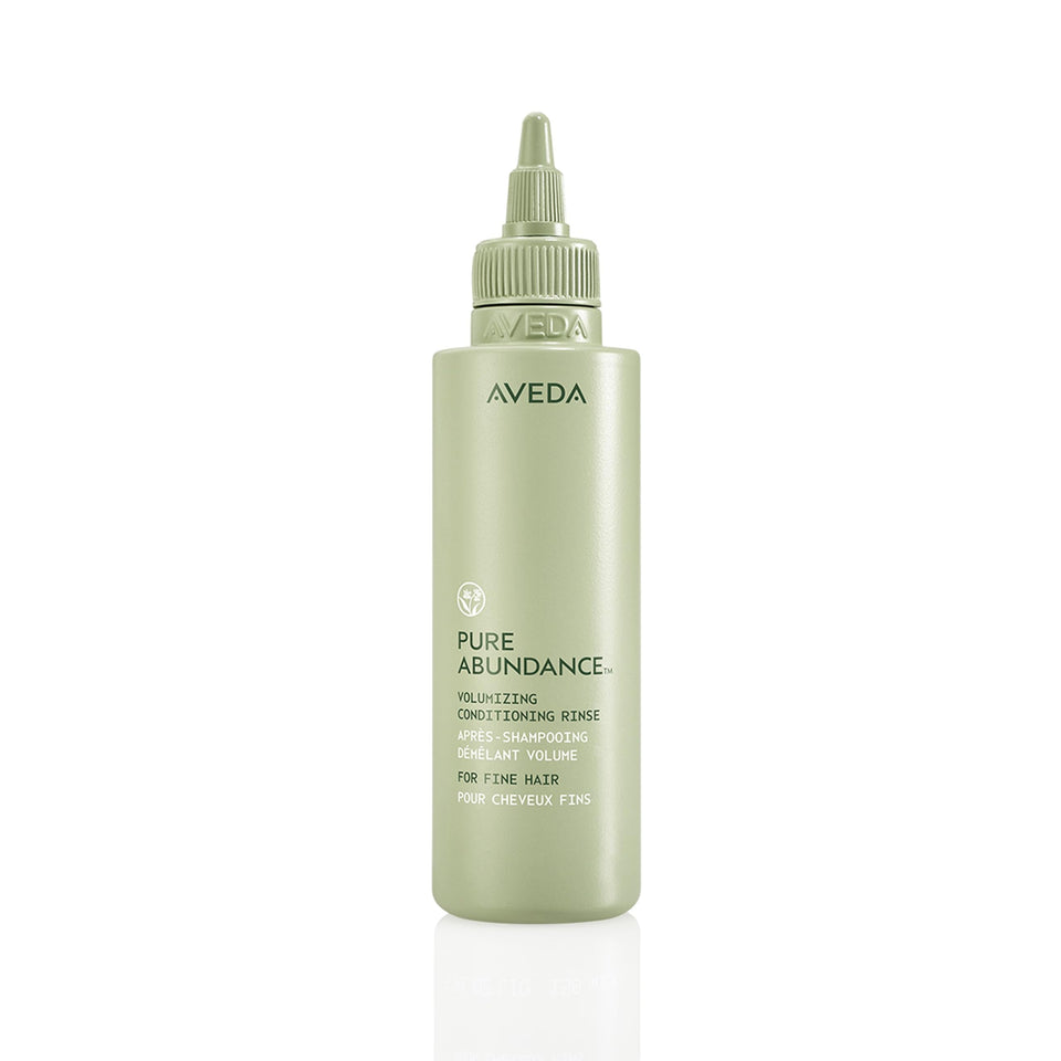 Aveda Pure Abundance front packaging showing bottle and label, conveys clean brand presentation