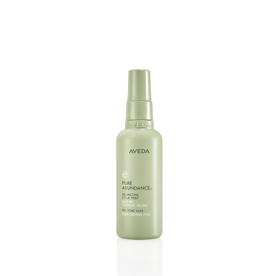 Aveda bottle front packaging showing product and volume benefit