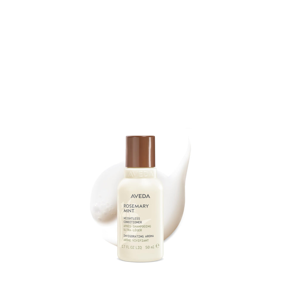 Aveda front bottle view showing lightweight design and energizing scent benefit