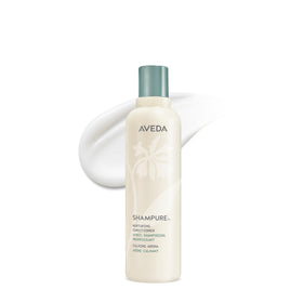 Aveda Shampure front packaging showing bottle and label, promotes gentle daily conditioning