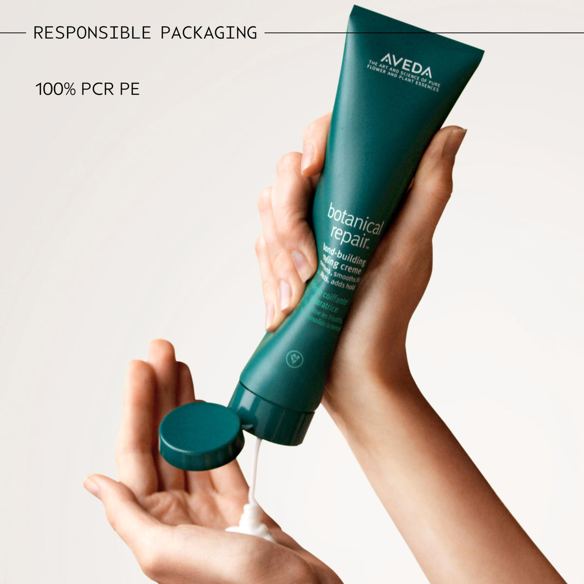 Aveda 5 fl oz bottle in hand for scale, indicating travel-friendly size benefit