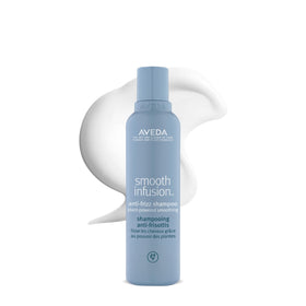 Aveda bottle front packaging showing product name and sleek benefit