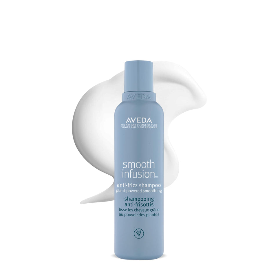 Aveda bottle front packaging showing product name and sleek benefit