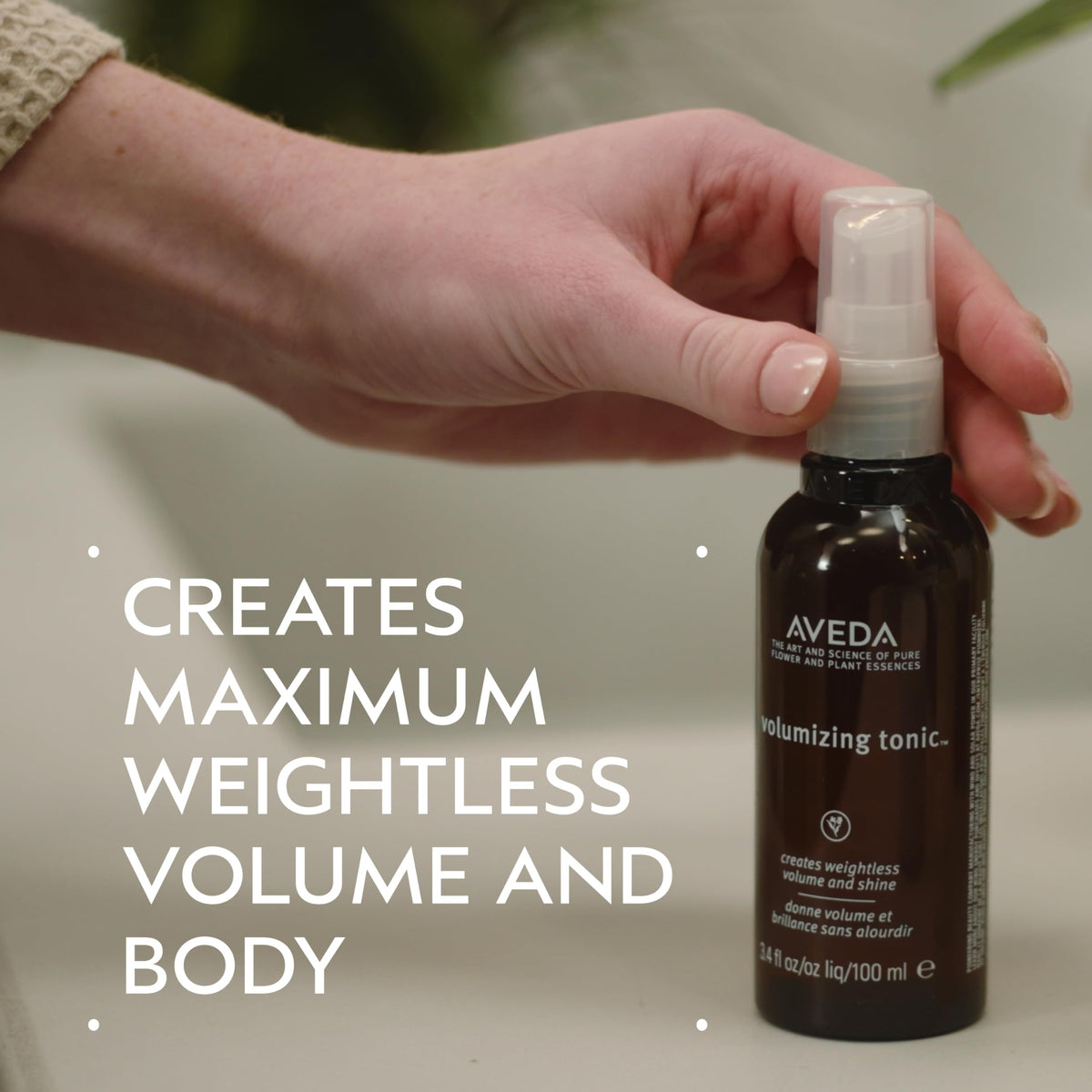 Aveda tonic spray nozzle close-up demonstrating precise root application