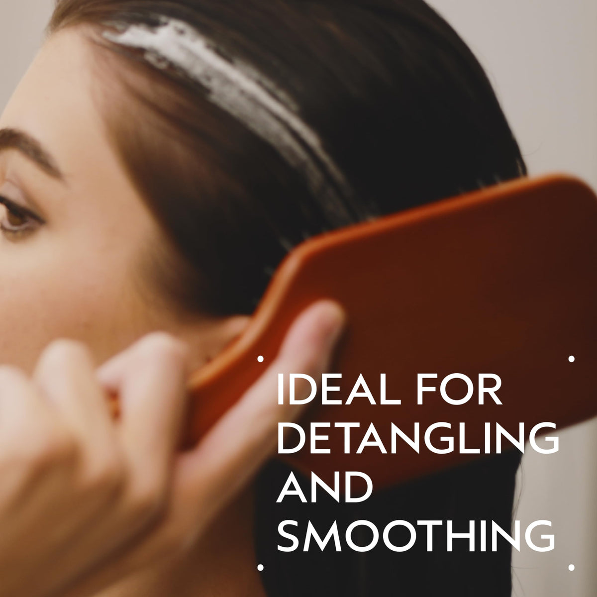 Aveda wooden paddle brush handle detail for comfortable, secure grip