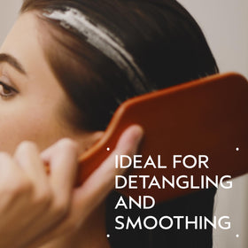 Aveda wooden paddle brush handle detail for comfortable, secure grip
