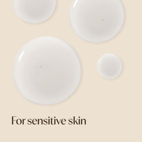 Aveeno serum applied on hand showing quick spreadability benefit