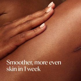Aveeno label detail highlighting oat oil and jojoba oil benefits for skin