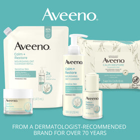Aveeno bottle beside oats emphasizing oat oil soothing and nourishing benefit