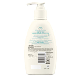 Aveeno bottle beside soft towel suggesting gentle skin care post-shower
