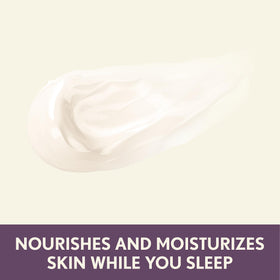 Applying Aveeno night cream to face and neck for overnight hydration