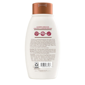 Aveeno hair after use smooth shiny ends showing strengthened appearance