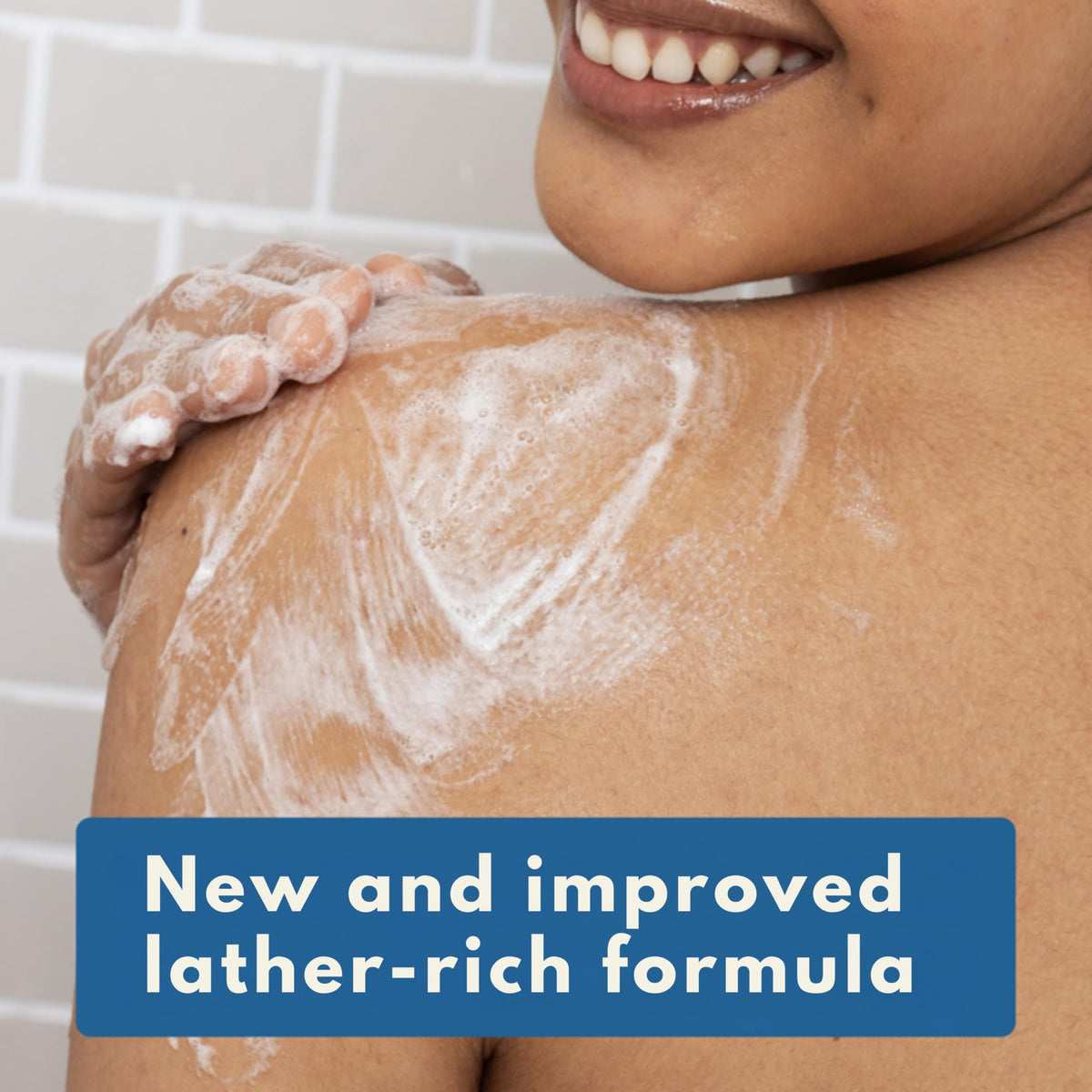Aveeno body wash in use on wet arm demonstrating gentle cleanse and comfort