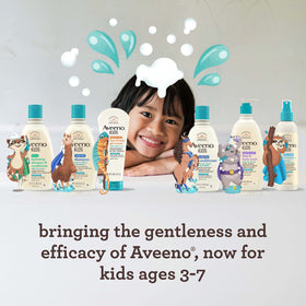 Child in bath using Aveeno Kids showing tear-free gentle wash