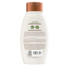 Aveeno label closeup featuring sulfate-free and paraben-free benefit