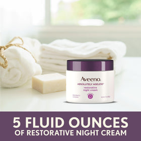 Aveeno jar on bathroom nightstand suggesting evening skincare routine