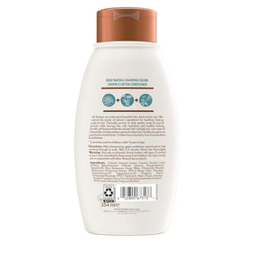 Lifestyle bathroom shelf with Aveeno conditioner suggesting calm, daily self-care ritual