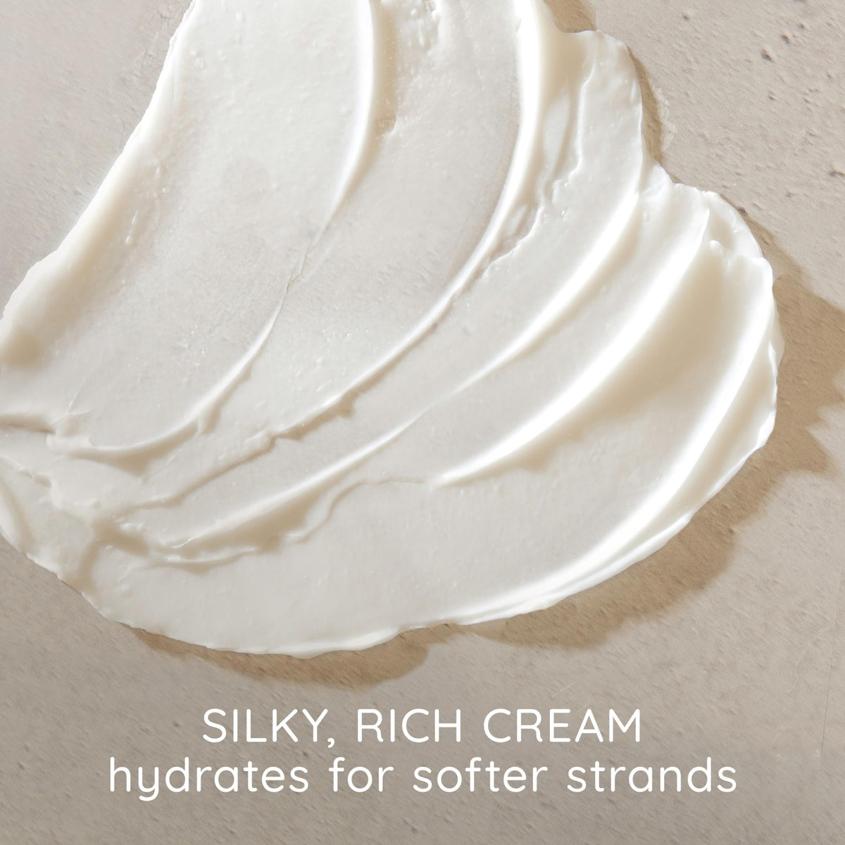 Aveeno creamy conditioner texture highlighting ultra-hydrating feel
