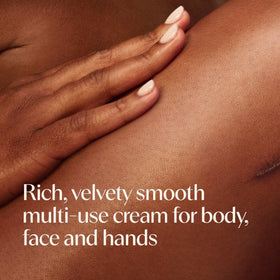 Aveeno open jar top view showing creamy consistency and volume