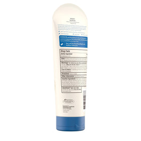 Aveeno 7.3 oz tube in hand showing true size and travel convenience