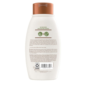 Aveeno shampoo applied to wet hair displaying hydration benefit