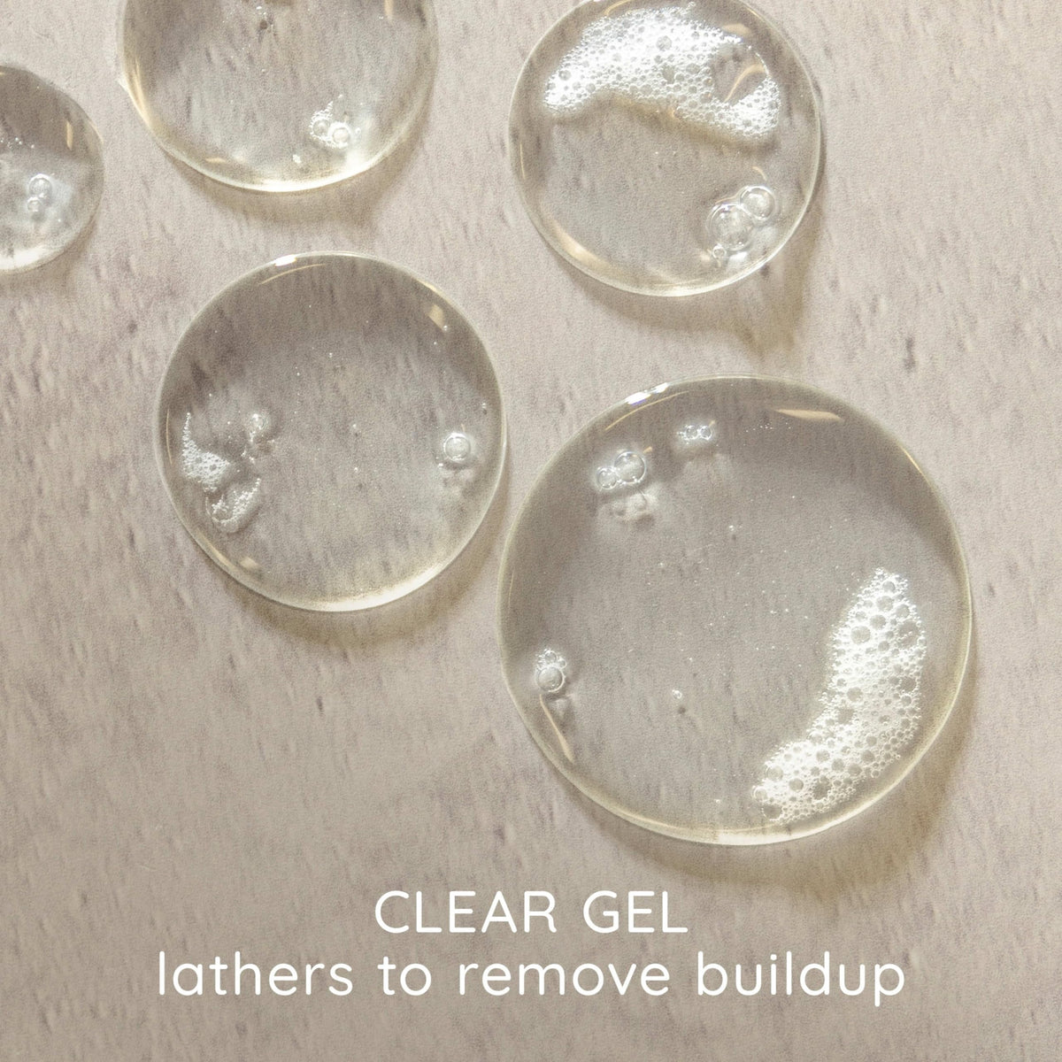 Aveeno shampoo lather on hair illustrating effective buildup removal