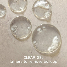 Aveeno shampoo lather on hair illustrating effective buildup removal