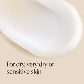 Aveeno 11 oz size compared with a hand to demonstrate true product scale