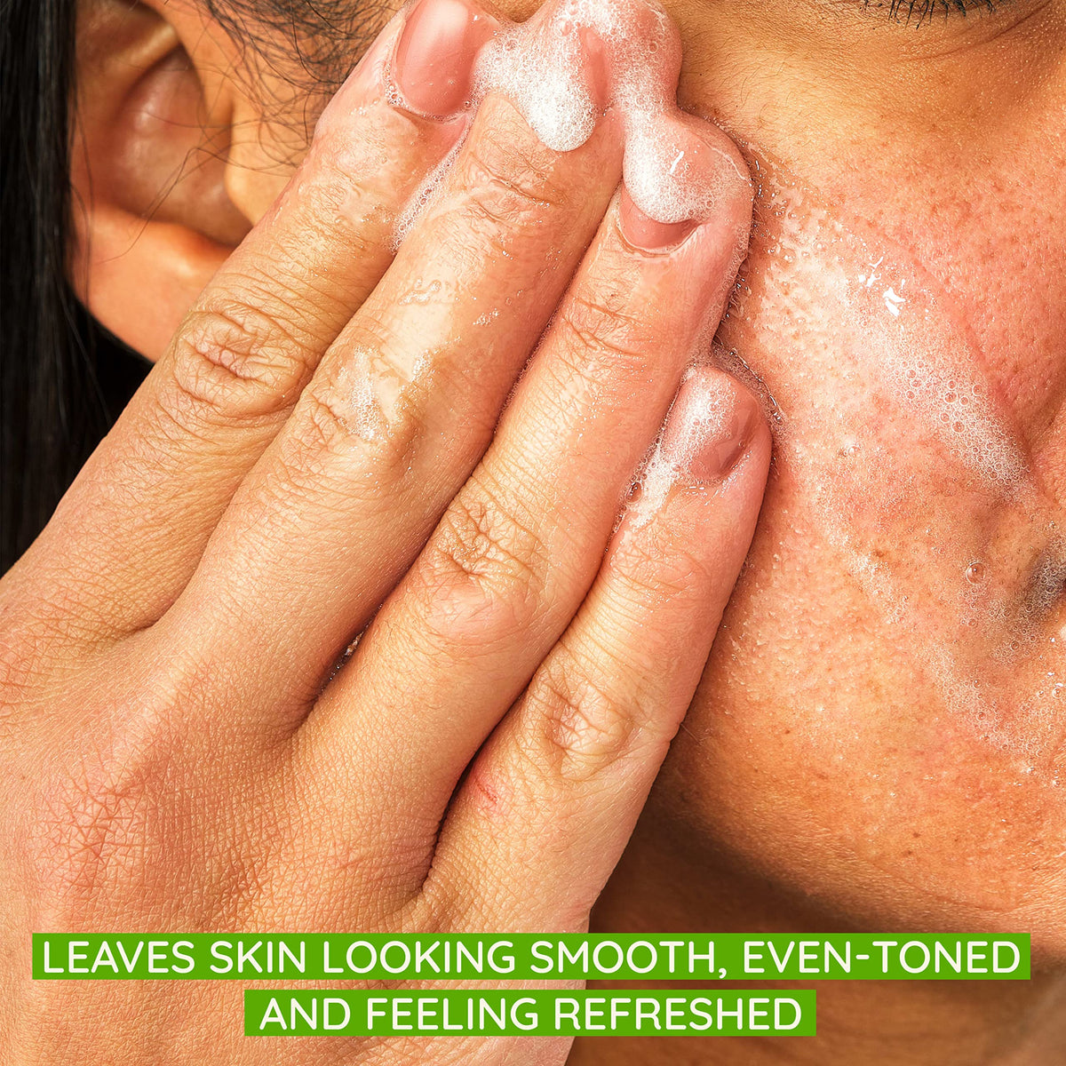 Aveeno close-up of scrub texture and beads revealing gentle exfoliation