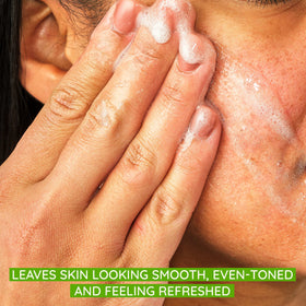 Aveeno close-up of scrub texture and beads revealing gentle exfoliation