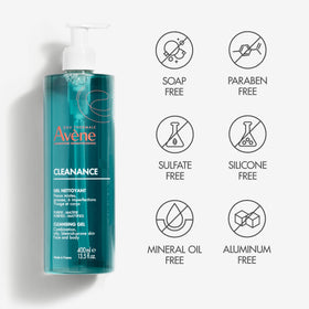 Bottle held next to hand to show Avène product size and scale