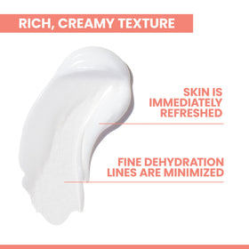 Avène cream on fingertips ready to apply, demonstrating easy absorption benefit