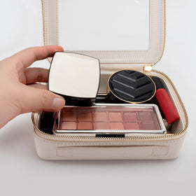 Aveniee held in hand for scale to show compact, travel-friendly benefit