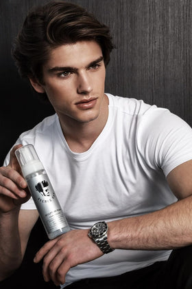 Avenue Man stylist applying foam on model in salon to show professional-grade performance