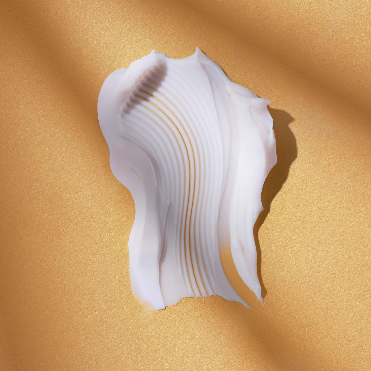 AVON Anew cream on a hand demonstrating smooth application and quick absorption