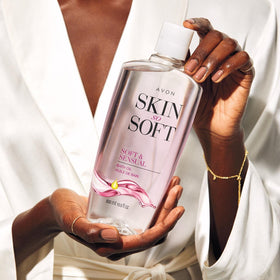AVON bath oil texture drop on skin, shows lightweight absorption and nourishing effect