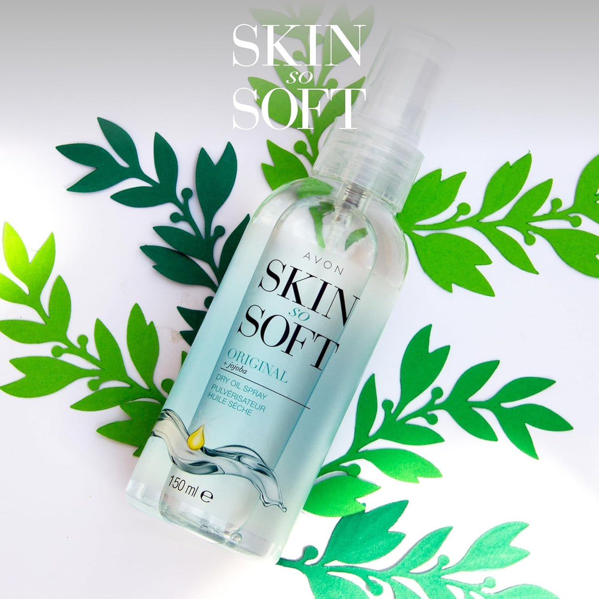 AVON SKIN SO SOFT label detail showing jojoba oil and vitamin E benefits