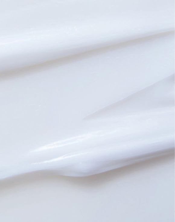 AVON Skin So Soft lotion texture on hand, fast-absorbing moisture benefit