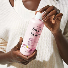 AVON product in use on forearm demonstrating soft, hydrated skin