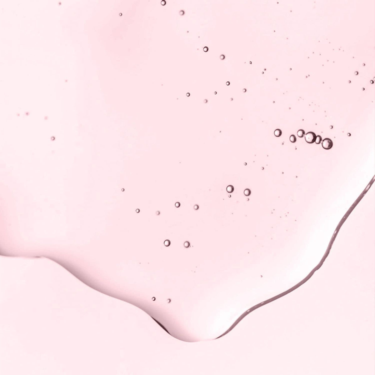 AVON VelvetSoak bottle close-up showing cap and ingredient callout, emphasizes argan benefits
