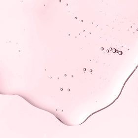 AVON VelvetSoak bottle close-up showing cap and ingredient callout, emphasizes argan benefits