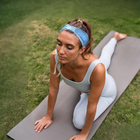 Awumbuk on model doing yoga demonstrating secure non-slip fit