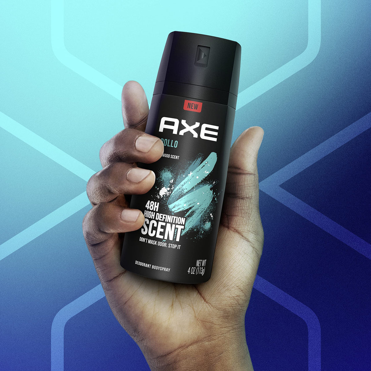 AXE Apollo held in hand to show 4 oz size and portable convenience